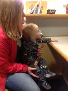 Wes being checked in not concerned that he's in his PJ's.