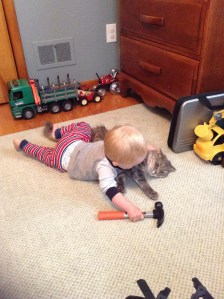 Snuggling with his cat